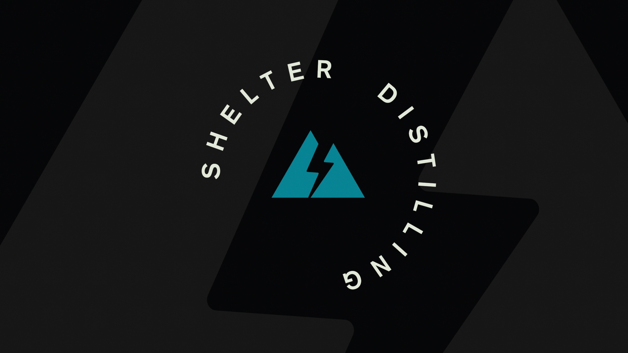 Shelter Distilling Logo on black background with white text