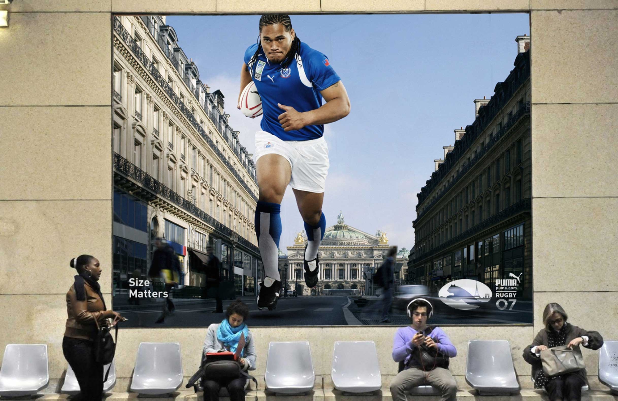 Puma rugby ad layout - rugby player in blue shirt and white shirts running