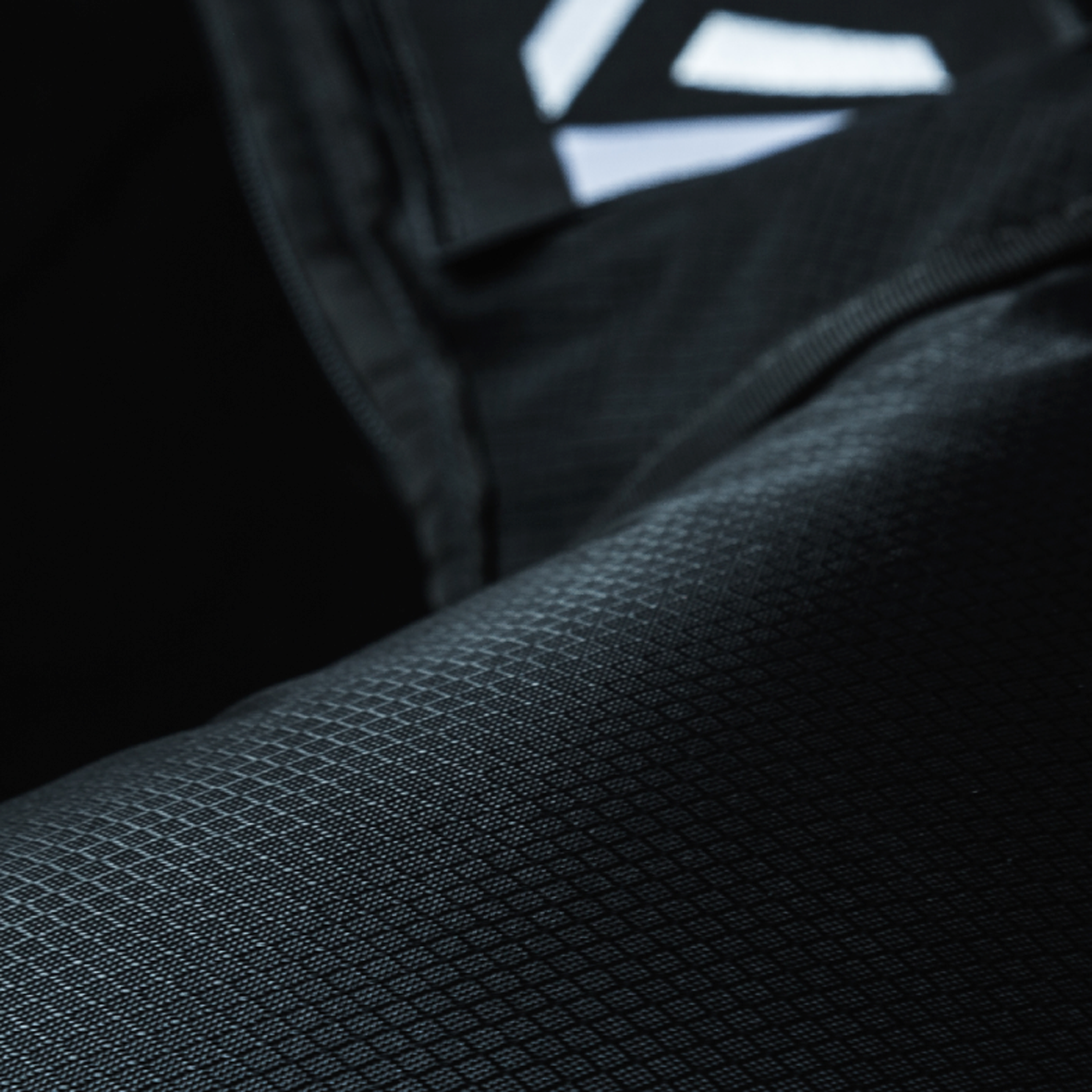 Normatec logo abstract